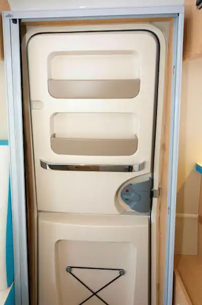 Every inch of savailable space is used for storage, including these pockets on the door (Click to view full screen)