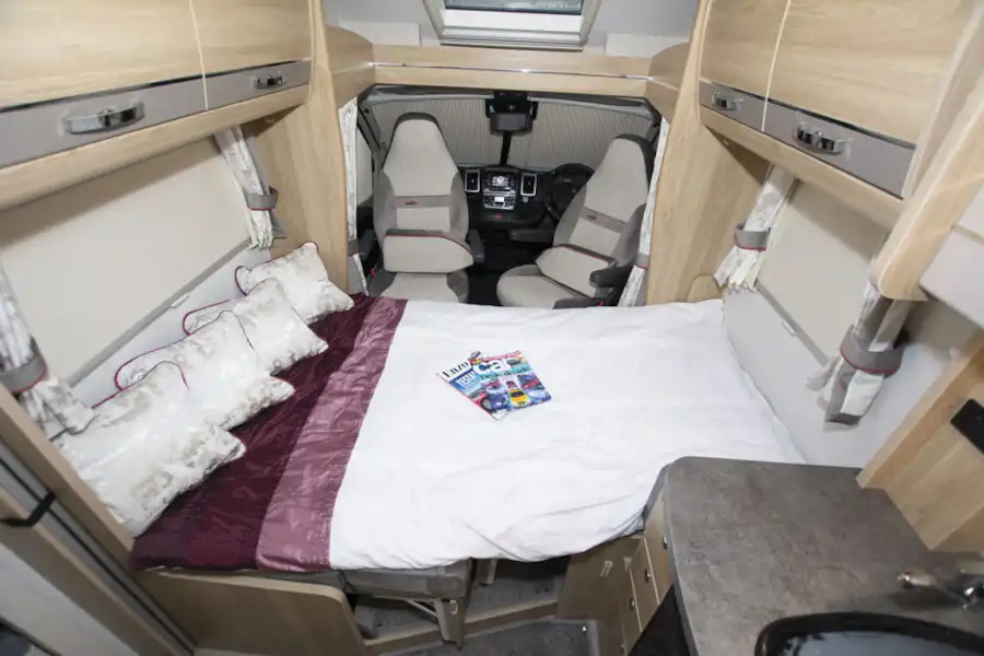 The front lounge converted to a bed in the Elddis Marquis Majestic 185 motorhome (Click to view full screen)