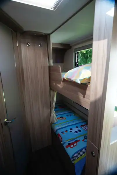 Bunks, each with a curtain, are in the nearside rear corner (Click to view full screen)