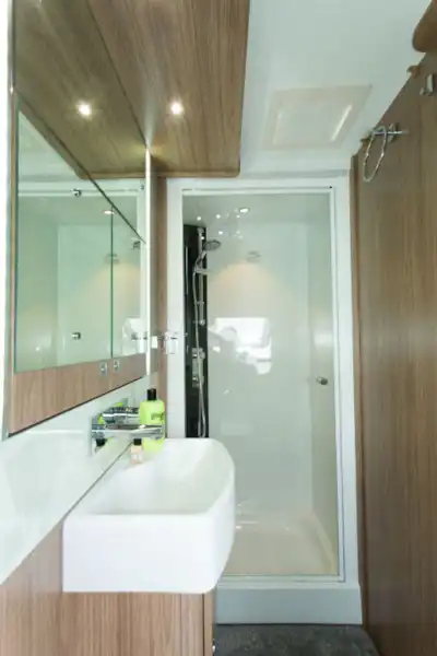 The shower cubicle is a good size - 65cm by 80cm, plus shelves for shampoo (Click to view full screen)