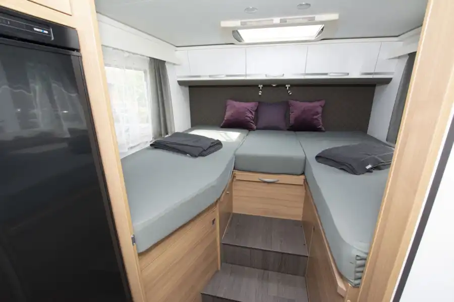 Twin beds in the Adria Coral Axess 600 SL motorhome (Click to view full screen)