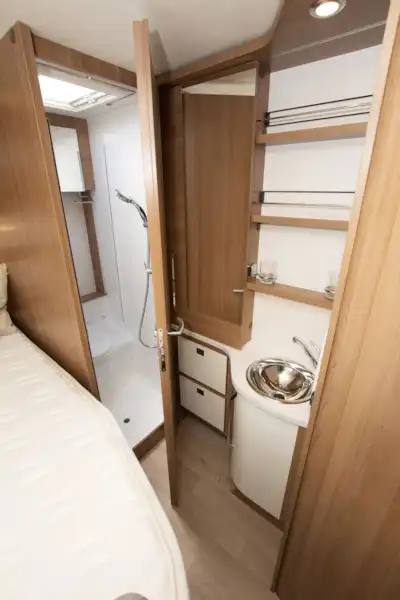 A view of the rear of the Rapido 656F motorhome, showing washroom and island bed (Click to view full screen)