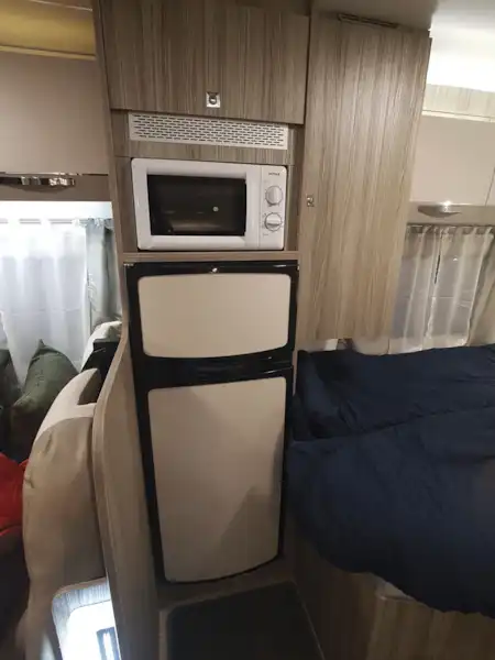 The fridge and microwave in the Benimar Mileo 231 motorhome (Click to view full screen)