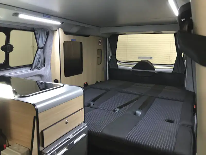 With the seats folded down to make a bed in the Danbury Fun! campervan (Click to view full screen)