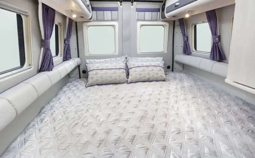 The double bed in the Auto-Sleeper Warwick Duo motorhome (Click to view full screen)