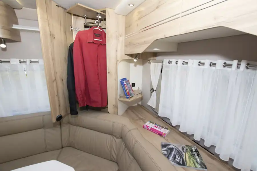 Useful wardrobe space in The U-shaped rear lounge in Le Voyageur Classic LV7.8LU motorhome (Click to view full screen)
