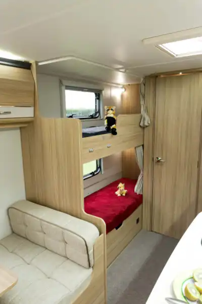 A cosy bunk area with easy access to the storage space below (Click to view full screen)