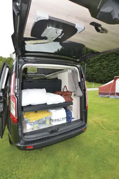 With the rear door open in the WildAx Proteus campervan (Click to view full screen)