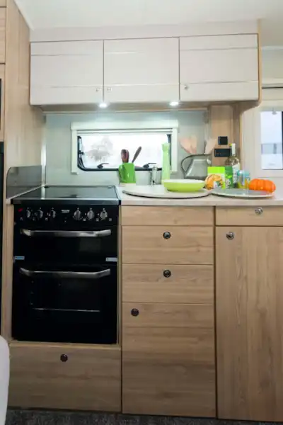 Lower kitchen storage consists of three drawers and cupboards. (Click to view full screen)