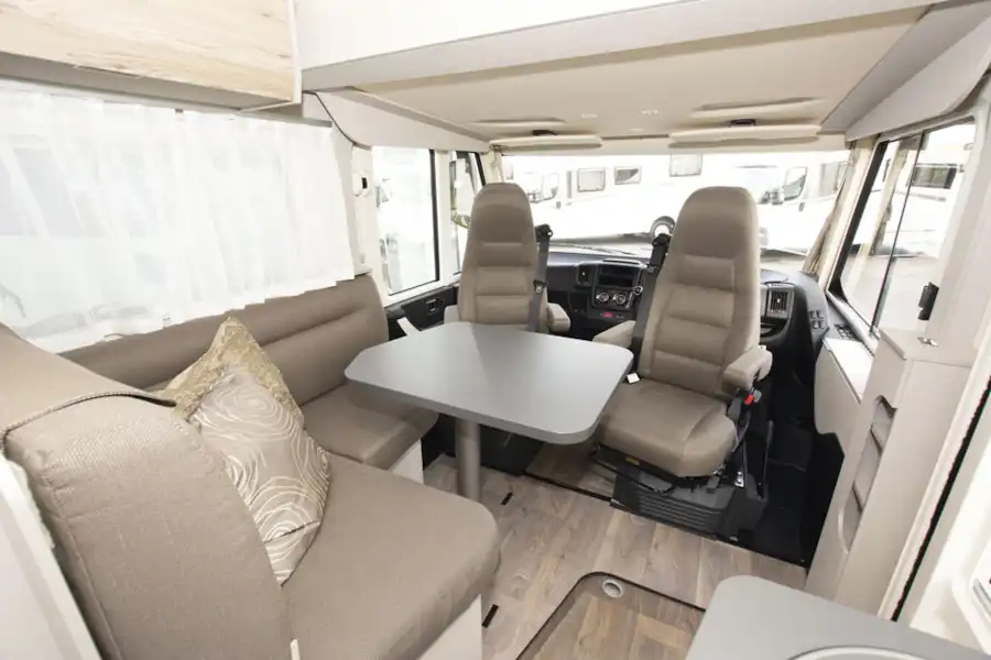 The lounge and cab area in the Hymer Exsis-i 580 motorhome (Click to view full screen)