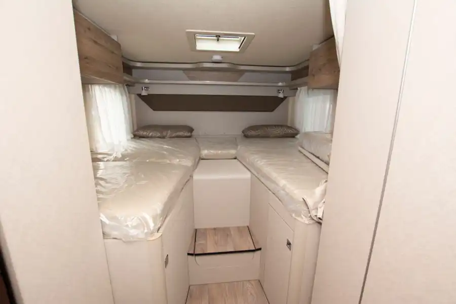 The bedroom in the Hymer Exsis i-580 motorhome  (Click to view full screen)