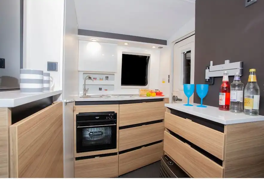 The Adria Action 361 LT caravan kitchen area (Click to view full screen)