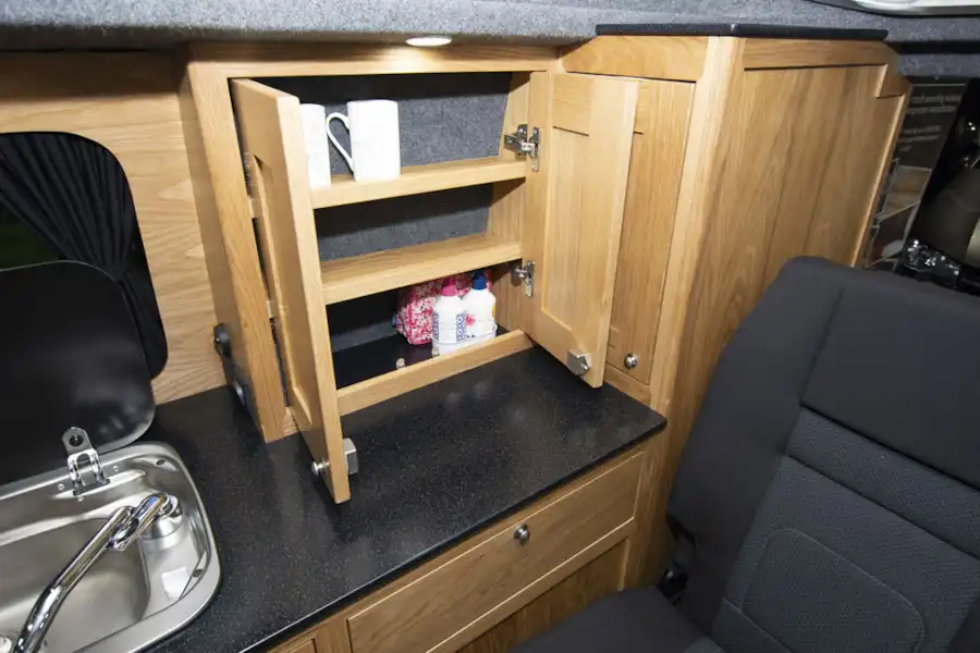Cupboard storage in the Rolling Homes Columbus S campervan (Click to view full screen)