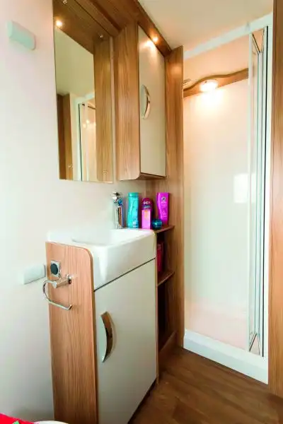 Plenty of cabinet space in the washroom (Click to view full screen)