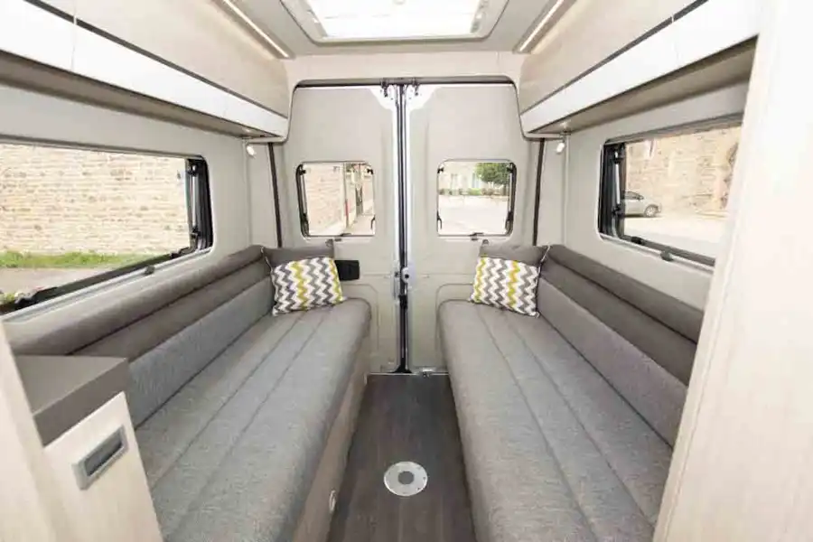 The impressive rear lounge, with seating in day mode (Click to view full screen)