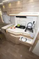 The kitchen in The U-shaped rear lounge in Le Voyageur Classic LV7.8LU motorhome