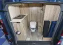 The rear of the campervan, with kitchen and toilet © Warners Group Publications, 2019