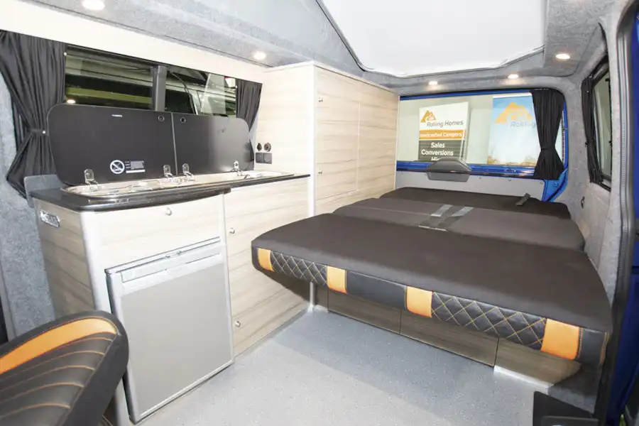 The fold down bed in the Rolling Homes Expedition campervan (Click to view full screen)