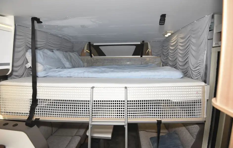 The drop down bed in the Adria Matrix Plus 600 DT motorhome (Click to view full screen)
