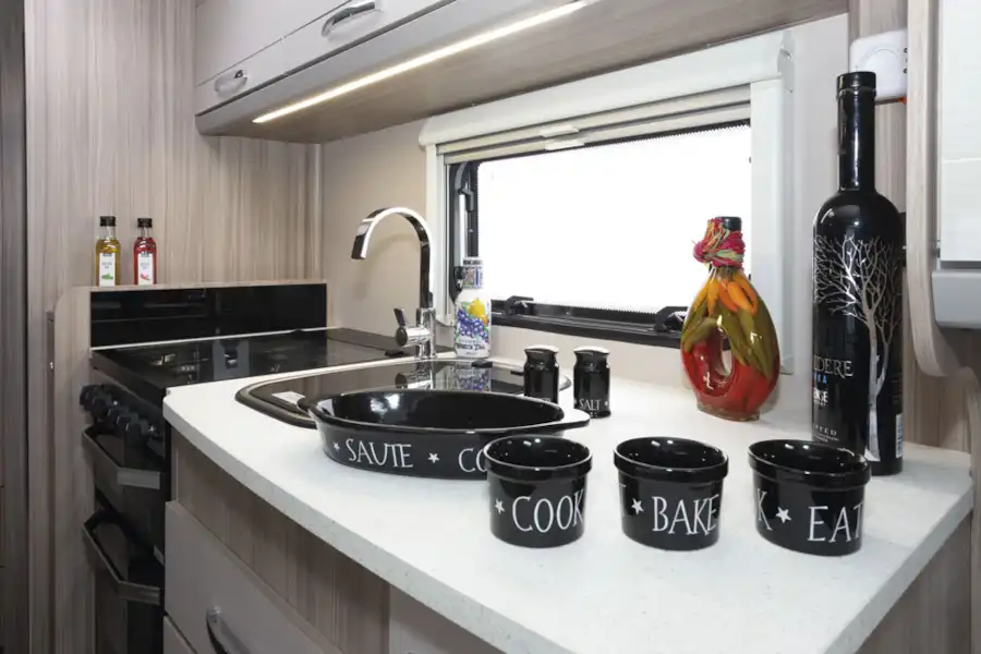 The kitchen in the Coachman Acadia Xcel 830 caravan (Click to view full screen)