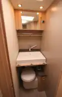 The washroom has a drop-down basin