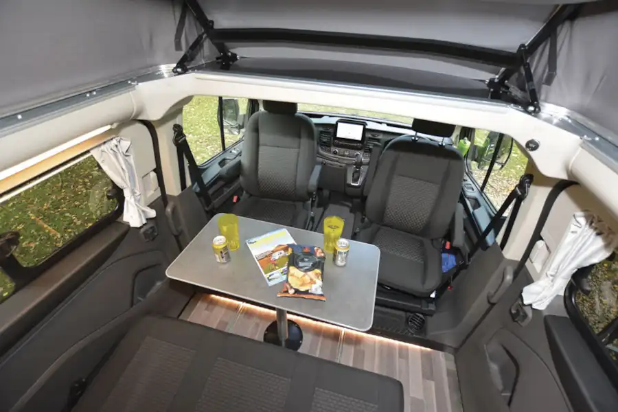 The lounge and table in the Ford Nugget  (Click to view full screen)