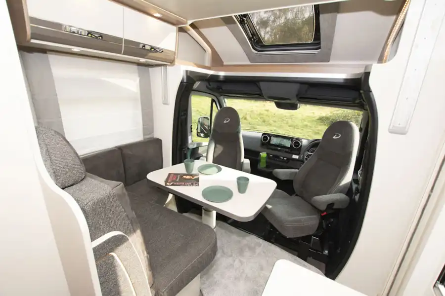 The lounge and table in the Dethleffs Globeline T 6613 EB motorhome (Click to view full screen)