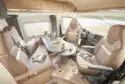 The lounge and cab area in the Malibu 600 DB Charming Coupe motorhome