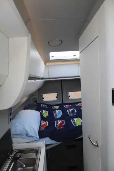 A view of the transverse bed in the Grand California 600 campervan (Click to view full screen)