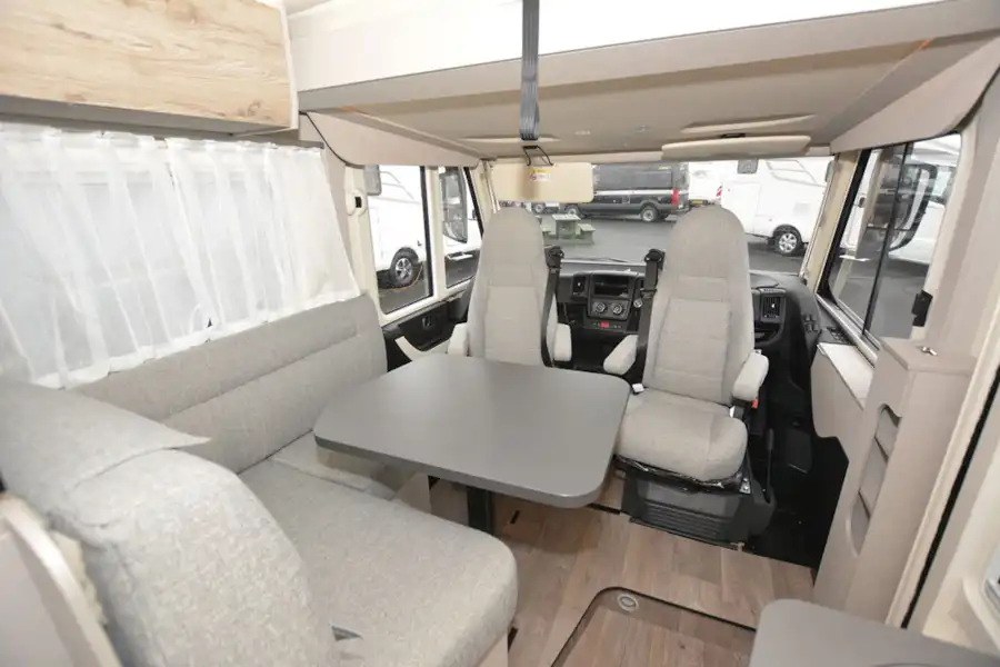 The lounge in the Hymer Exsis-i 580 Pure motorhome (Click to view full screen)