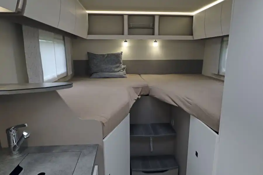 The stylish bedroom in the Frankia Neo MT 7 GD motorhome (Click to view full screen)