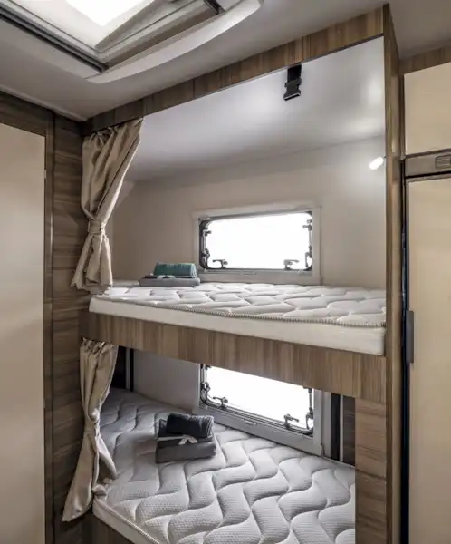 Rear bunk beds in the Rimor Evo Sound motorhome (Click to view full screen)