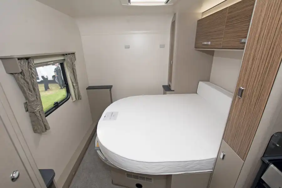 The transverse double bed in the Swift Edge 494 motorhome (Click to view full screen)