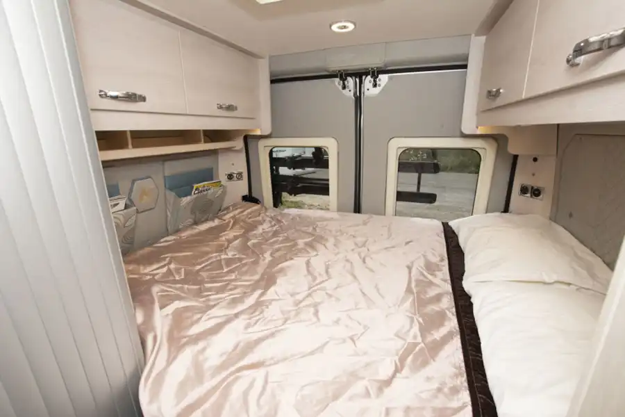 The main bed in the Auto-Sleepers Fairford campervan (Click to view full screen)