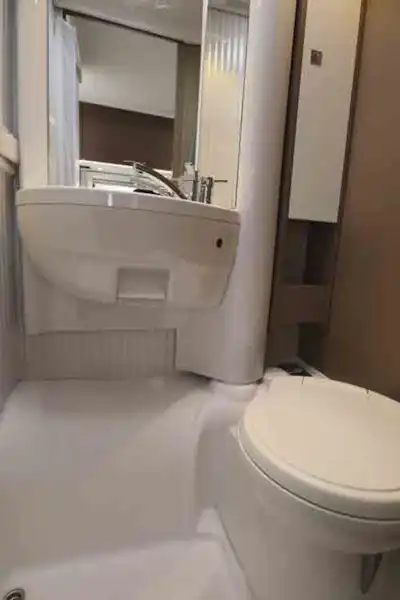 The washroom has a swivel cassette toilet (Click to view full screen)