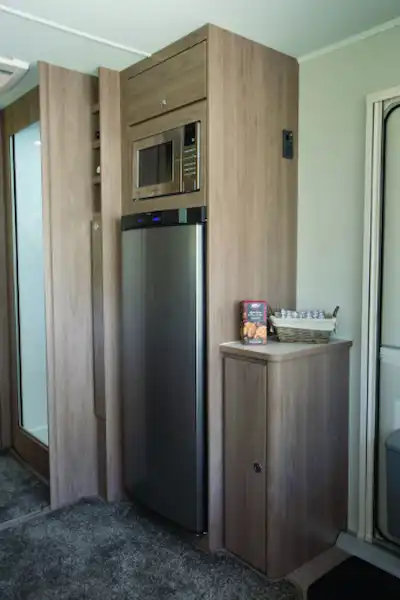 The dresser and fridge freezer are opposite the kitchen (Click to view full screen)