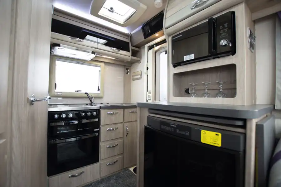 The kitchen in the Auto-Sleepers Broadway EK TB LP motorhome (Click to view full screen)