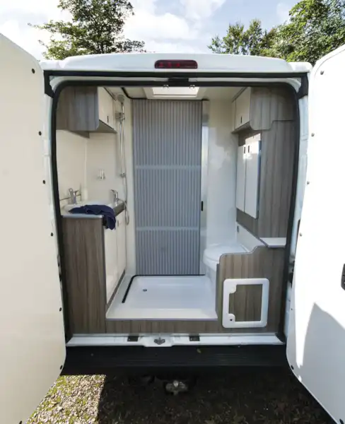 With the rear doors of the The Axon Opportunity campervan open (Click to view full screen)