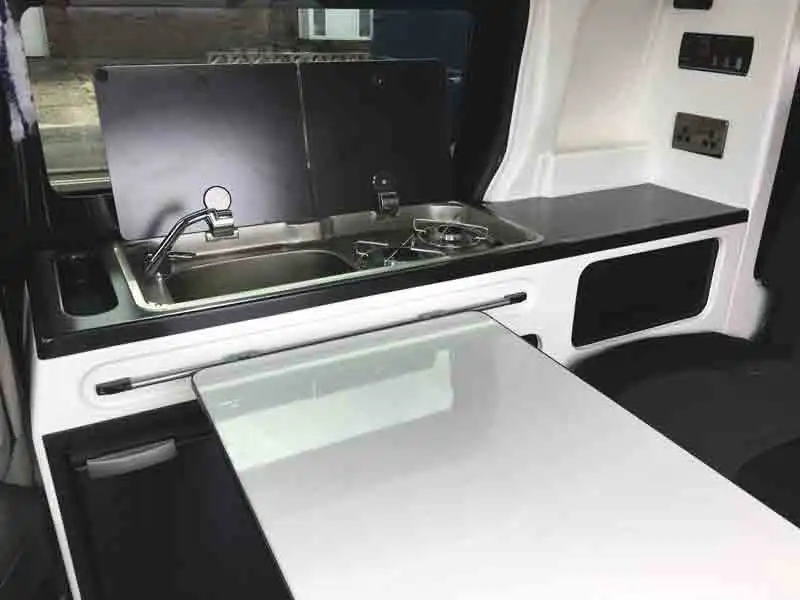 The side galley, with hob, sink and two gas burners (Click to view full screen)