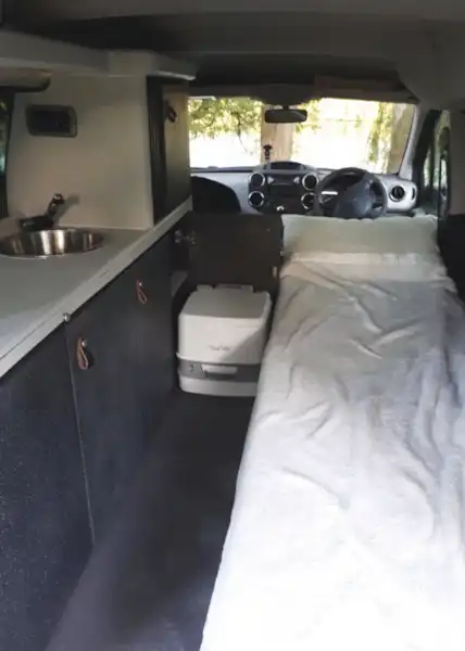 With the bed made up in the Stimson Free Spirit campervan  (Click to view full screen)