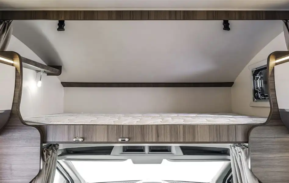 The overcab bed in the Rimor Evo Sound motorhome (Click to view full screen)