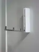 A hinge-down hanger for towels or clothes