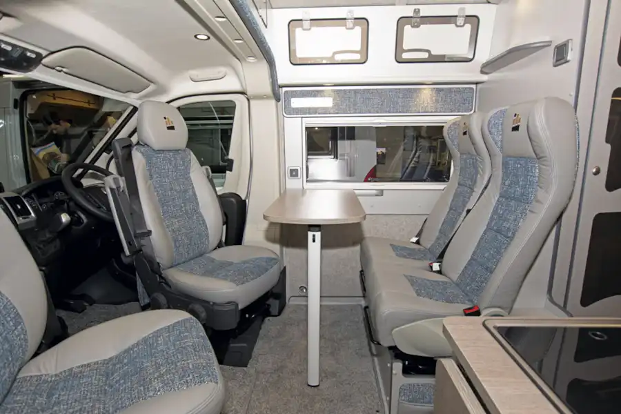 The cab and travel seats in the IH 600 RD/S4 campervan (Click to view full screen)