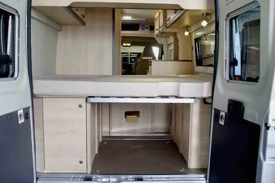 The rear doors open to show storage (Click to view full screen)
