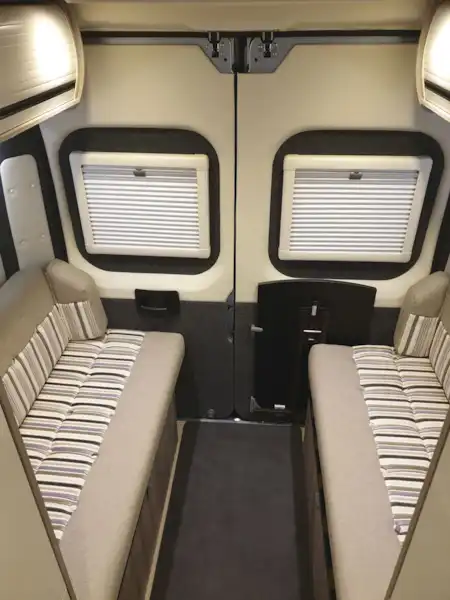 The side-facing settees in the WildAx Aurora campervan (Click to view full screen)