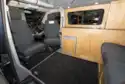 With cab seats turned to face the lounge area in the Rolling Homes Columbus S campervan
