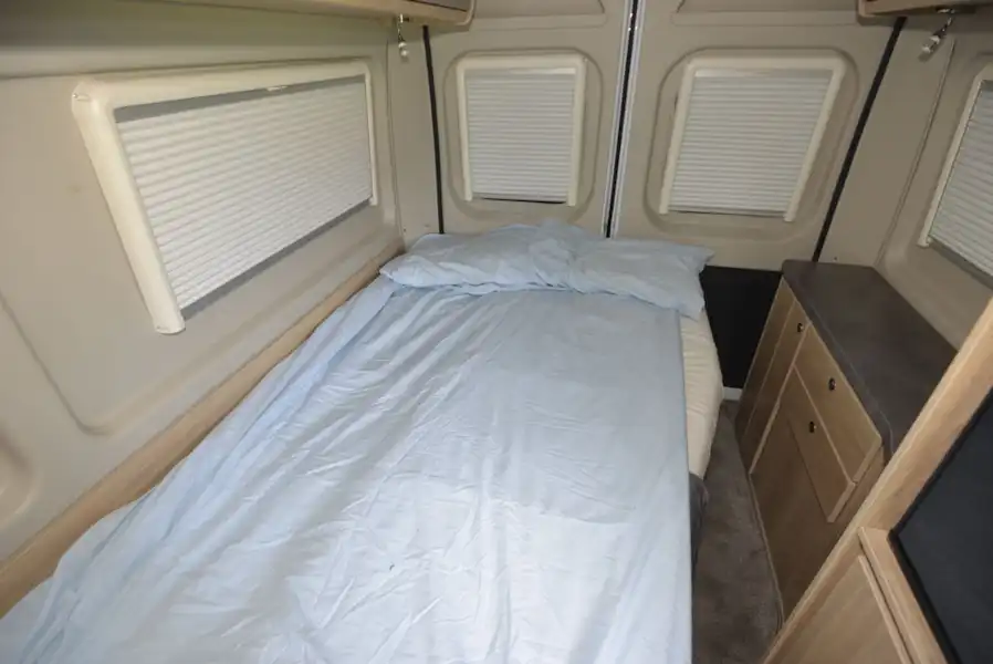 The bed in the Elddis Autoquest CV60 campervan (Click to view full screen)