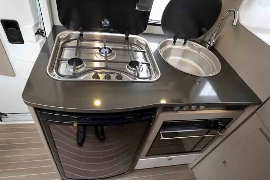 The kitchen includes a three-burner gas hob and a Thetford grill/oven (Click to view full screen)