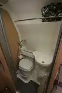 The washroom includes a sliding basin