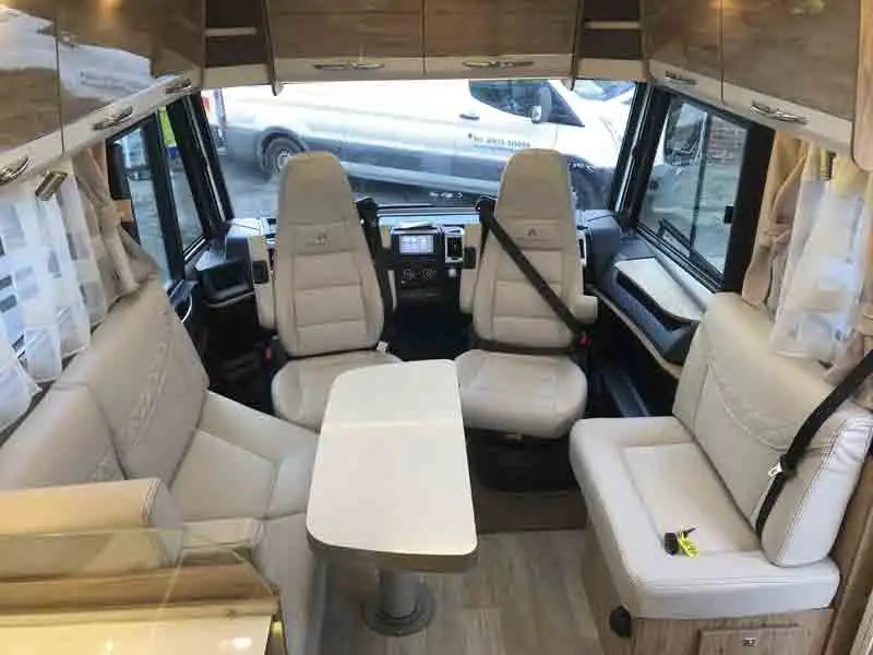 View of the lounge and cab - picture courtesy of Oakwell Motorhomes (Click to view full screen)